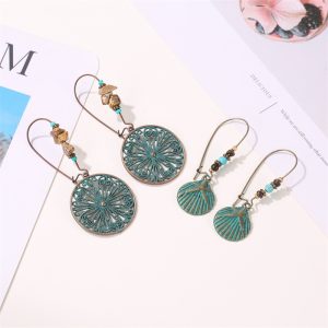Ethnic style carved earrings, women's ancient bronze exaggerated openwork flower leaf earrings, bohemian green plant earrings
