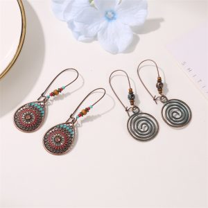 Ethnic style carved earrings, women's ancient bronze exaggerated openwork flower leaf earrings, bohemian green plant earrings