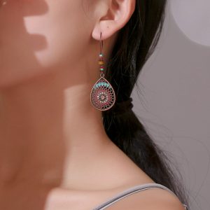 Ethnic style carved earrings, women's ancient bronze exaggerated openwork flower leaf earrings, bohemian green plant earrings