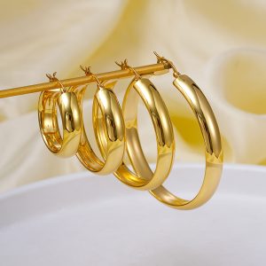 European and American cross-border fashion hollow curved geometric earrings female niche high-end French 18K gold-plated earrings wholesale
