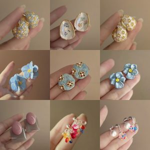 Embossed haze blue French retro drip glaze rose flower zircon earrings women's light luxury sense of luxury niche temperament