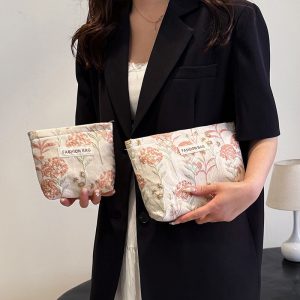 INS cream embroidery flower premium sense makeup bag large capacity water milk storage bag women's makeup portable clutch