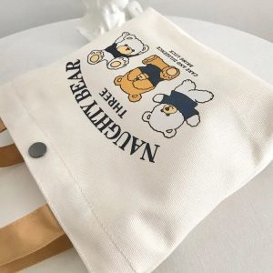 [Newcomer 0.01 free shipping] bear canvas bag portable trumpet small hand carrying lunch box to work handbag wholesale