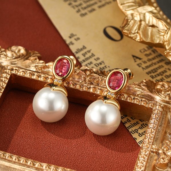 French vintage elegant ruby pearl stud earrings silver needle niche New Year's earrings high-end light luxury fashion earrings