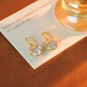 Korean version of the new drop glaze camellia zircon earrings French niche temperament earrings light luxury high-end earrings wholesale