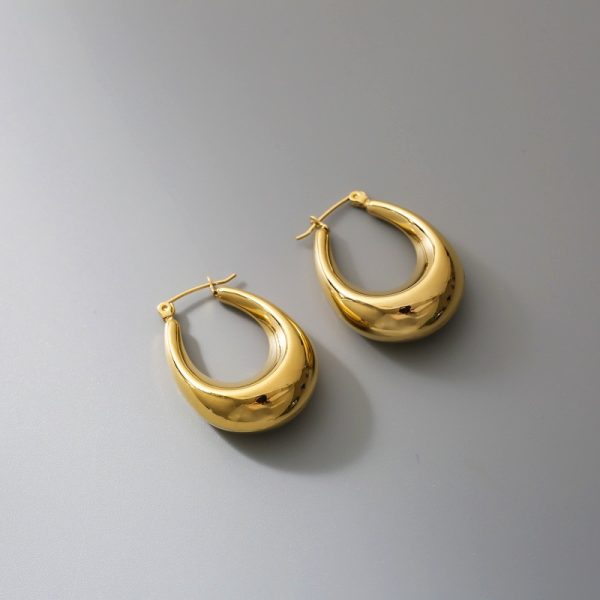Titanium steel slimming light luxury earrings, women's ins Internet celebrity French niche design, exaggerated water drop oval high-end earrings