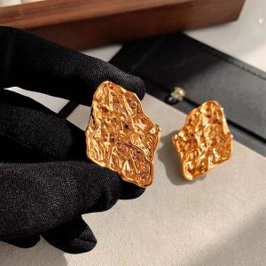 Atmospheric sense of luxury, retro pleated metal earrings, female European and American niche designers, irregular exaggerated personality earrings
