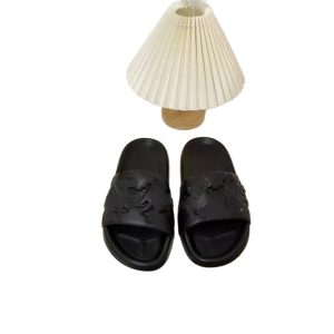 Foreign trade L home new letter embossed slippers men's 2024 spring and summer flat-bottomed top layer cowhide versatile slippers women