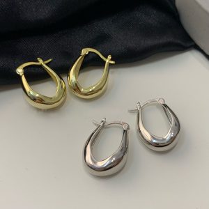 S925 silver needle earrings women's simple and cold style white earrings European and American metal photosensitive surface ear buckles daily French earrings