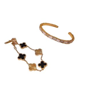 Black gold four-leaf clover bracelet women's light luxury niche delicate snake sparkling diamond flower bracelet luxury sense 2024 new style