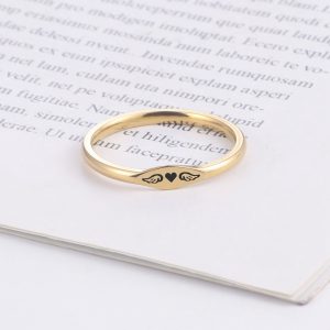 Cross-border popular angel wing rings, European and American women's simple heart-shaped tail rings, tide men's hearts, titanium steel jewelry wholesale