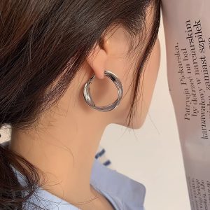S925 silver needle French vintage metal earrings women's niche design high-end Hong Kong style twisted earrings versatile earrings