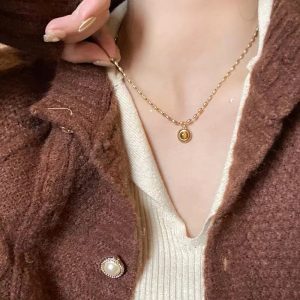 Korean high-end butterfly necklace women's niche light luxury versatile clavicle chain spring and summer long imitation pearl jewelry new