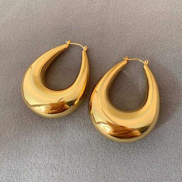 French vintage gold drop earrings, women's niche design, cold wind earrings, light luxury, high-end personality earrings - Image 2