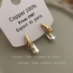 Two-color stitching drop earrings are niche and unique, with a versatile personality, simple stud earrings, and women's autumn and winter luxury