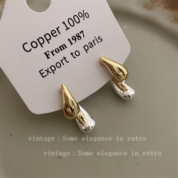 Two-color stitching drop earrings are niche and unique, with a versatile personality, simple stud earrings, and women's autumn and winter luxury