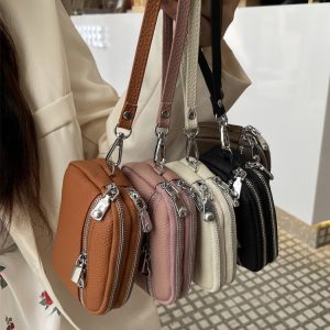 Genuine leather women's coin purse 2025 new top-layer cowhide niche double zipper storage bag multi-functional fashionable hand