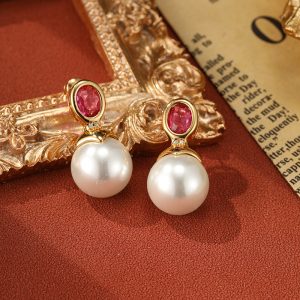 French vintage elegant ruby pearl stud earrings silver needle niche New Year's earrings high-end light luxury fashion earrings