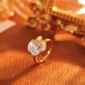 Korean version of the new drop glaze camellia zircon earrings French niche temperament earrings light luxury high-end earrings wholesale