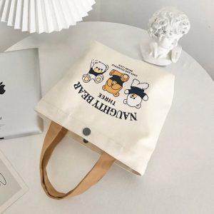 [Newcomer 0.01 free shipping] bear canvas bag portable trumpet small hand carrying lunch box to work handbag wholesale