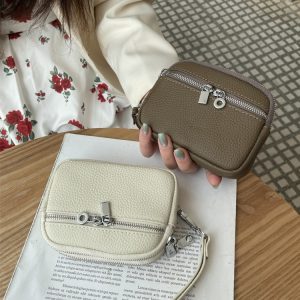Genuine leather women's coin purse 2025 new top-layer cowhide niche double zipper storage bag multi-functional fashionable hand