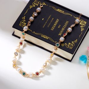 European and American new hip-hop niche diamond-encrusted pearl splicing necklace women's design sense pearl colored diamond flower necklace wholesale
