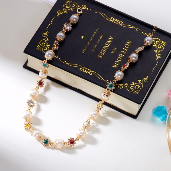 European and American new hip-hop niche diamond-encrusted pearl splicing necklace women's design sense pearl colored diamond flower necklace wholesale - Image 3