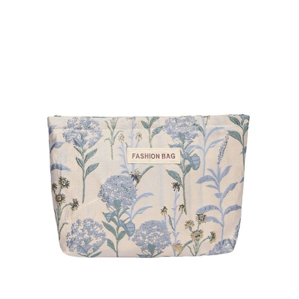 INS cream embroidery flower premium sense makeup bag large capacity water milk storage bag women's makeup portable clutch - Image 5