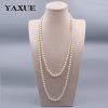 European and American cross-border explosive fashion temperament, versatile glass pearl long women's necklace, simple and hot-selling sweater chain jewelry