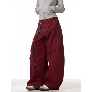 2025 spring autumn new year red jeans women's national tide deconstructed scimitar design loose mopping trousers tide