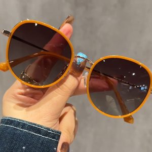 P28119 Japanese and Korean hot selling sweet round frame sunglasses female manufacturer mixed batch out of the street to pose for high-end dark brown tea sunglasses