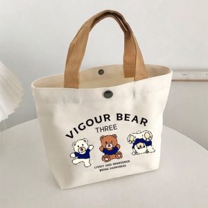 [Newcomer 0.01 free shipping] bear canvas bag portable trumpet small hand carrying lunch box to work handbag wholesale