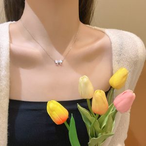 Light luxury niche cat's eye stone bow necklace female ins tide super fairy all-match temperament small fresh titanium steel clavicle chain